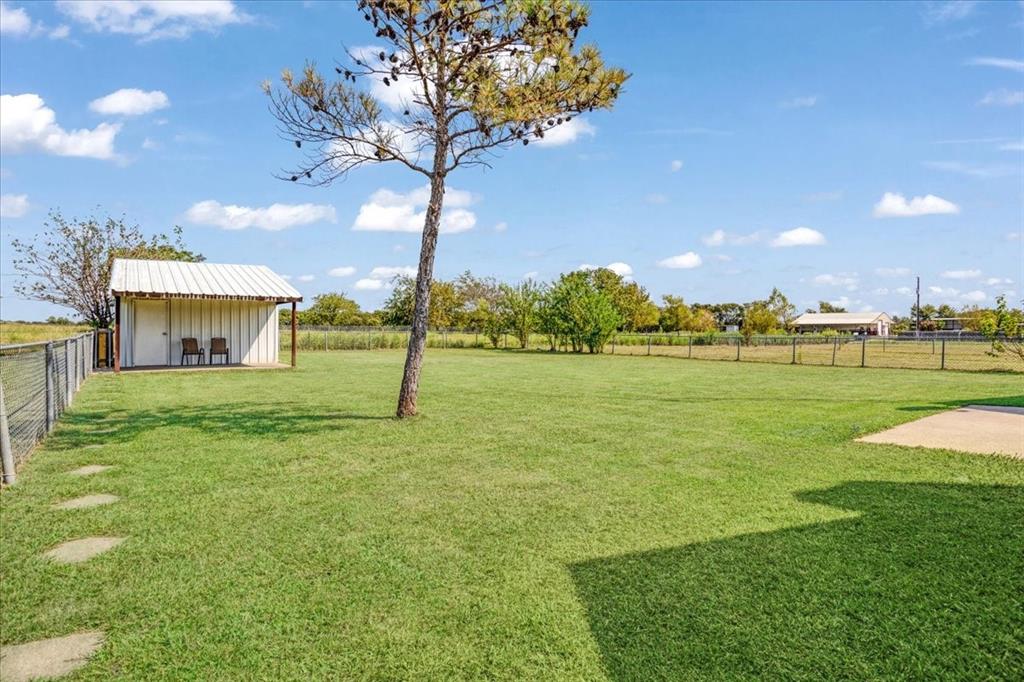 336 Old Highway 6 Howe, TX 75459 - Photo 34 of 40 a view of a patio with a big yard
