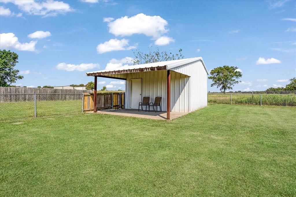 336 Old Highway 6 Howe, TX 75459 - Photo 35 of 40 a view of a house with a backyard