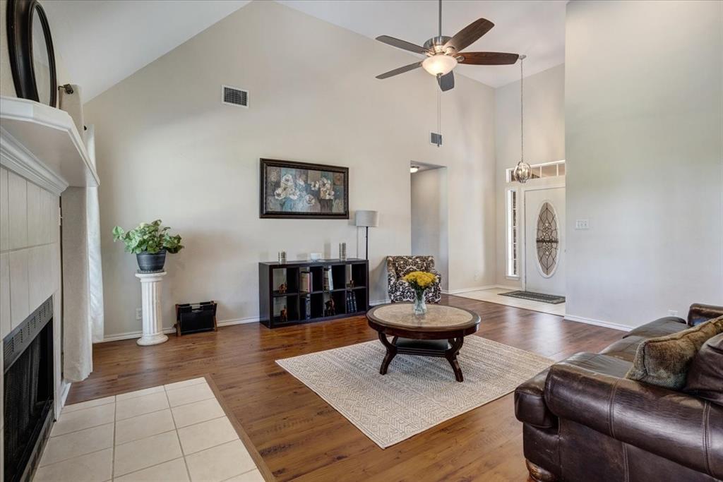 336 Old Highway 6 Howe, TX 75459 - Photo 6 of 40 a living room with furniture and a fireplace