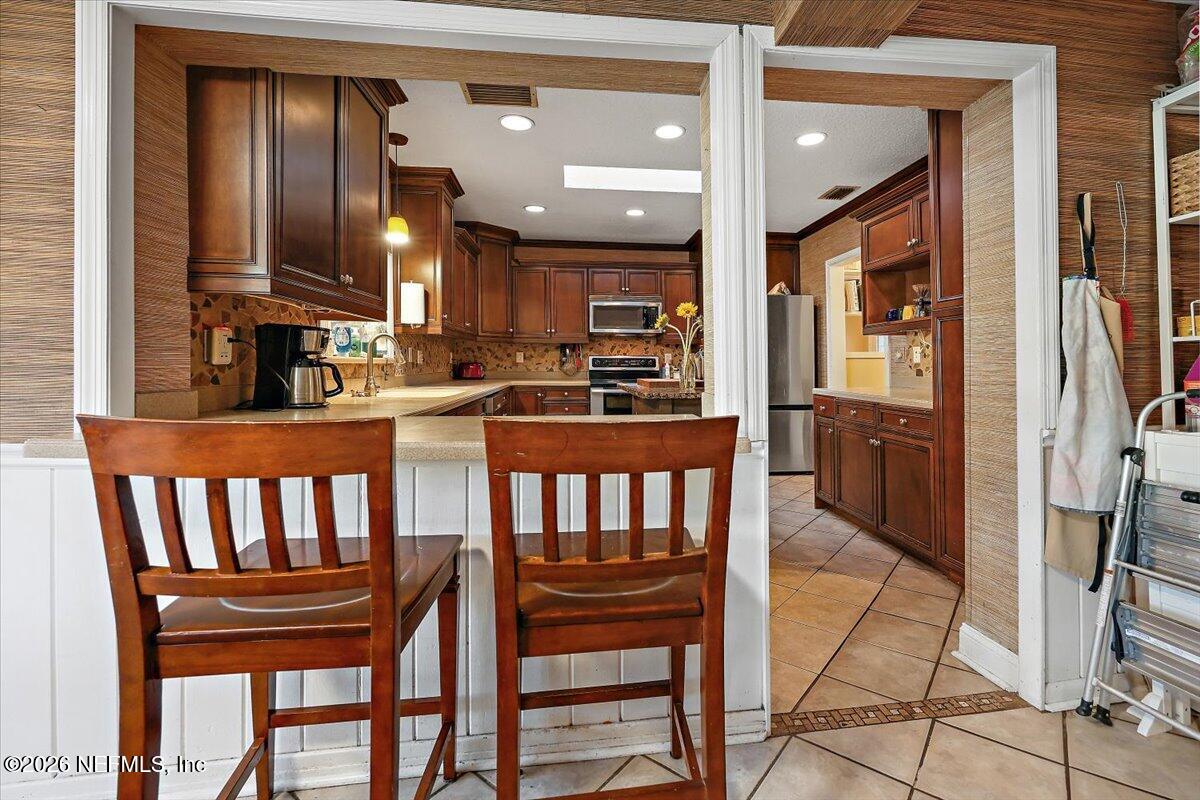 11037 Scott Mill Road Jacksonville, FL 32223 - Photo 12 of 51 11-View to Kitchen