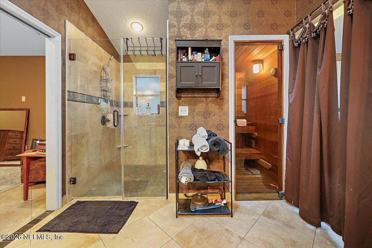 11037 Scott Mill Road Jacksonville, FL 32223 - Photo 20 of 51 19-Primary Bath Walk-In Shower_Sauna
