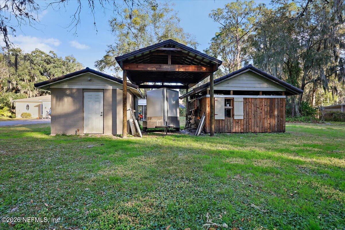 11037 Scott Mill Road Jacksonville, FL 32223 - Photo 30 of 51 29-Work Shed_RV Parking