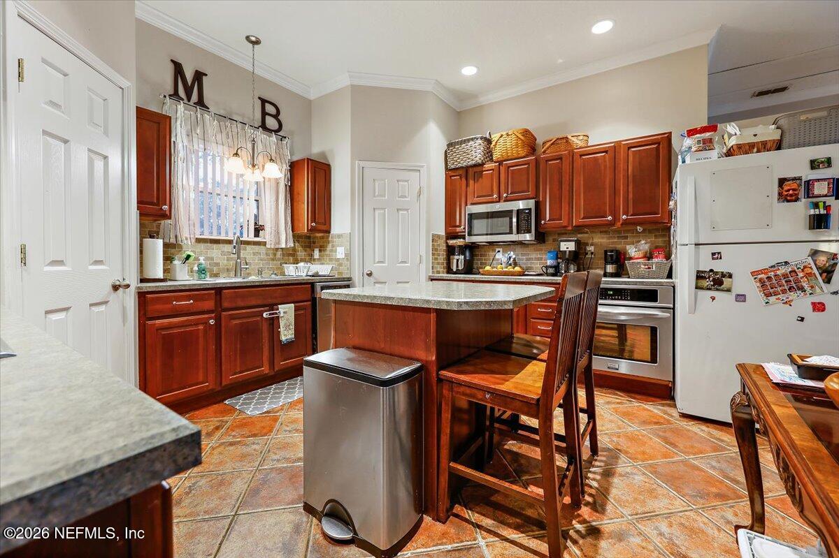 11037 Scott Mill Road Jacksonville, FL 32223 - Photo 36 of 51 35-Kitchen