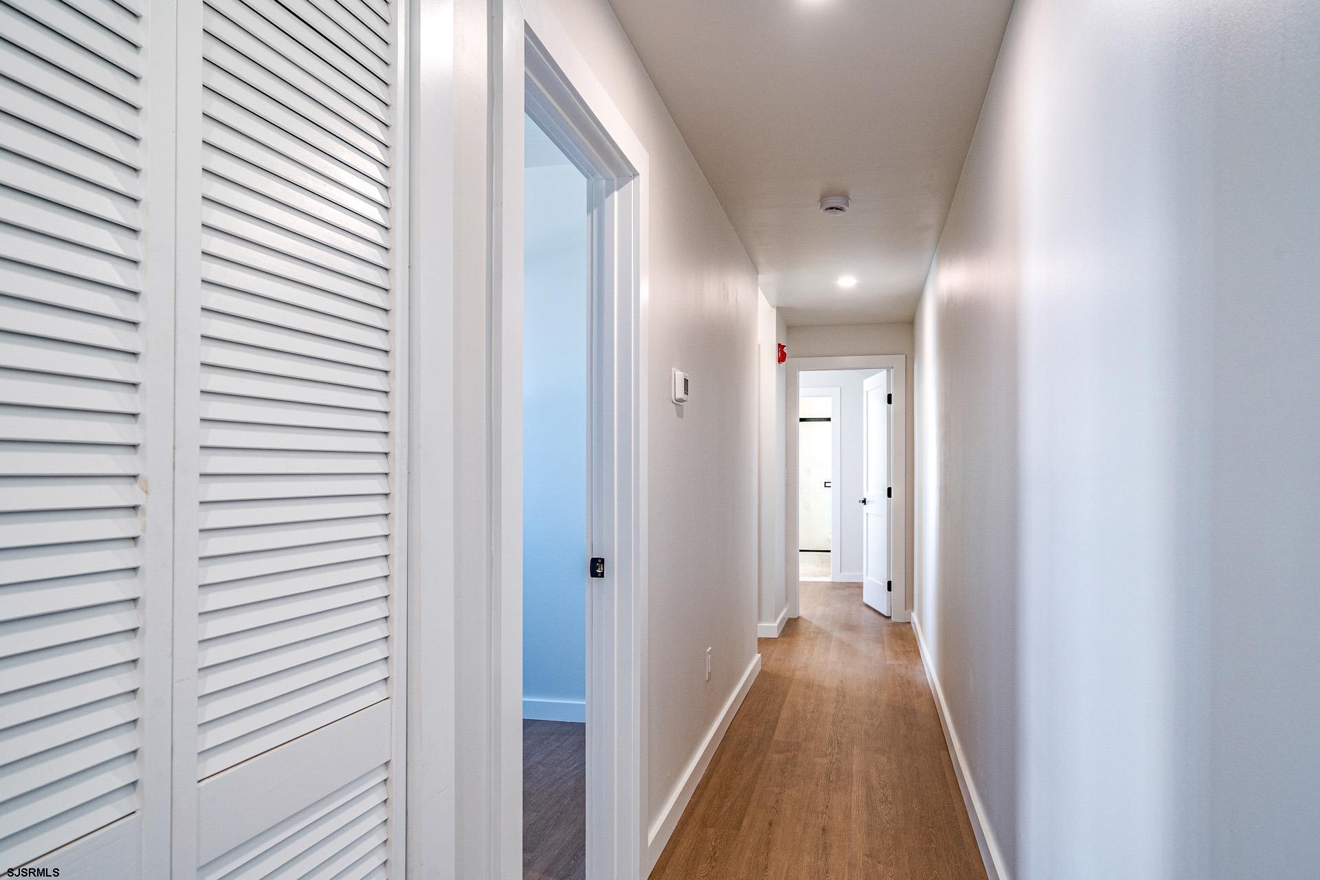 713 East 8th Street, Unit B Ocean City, NJ 08226 - Photo 8 of 25 a view of a hallway with a white door