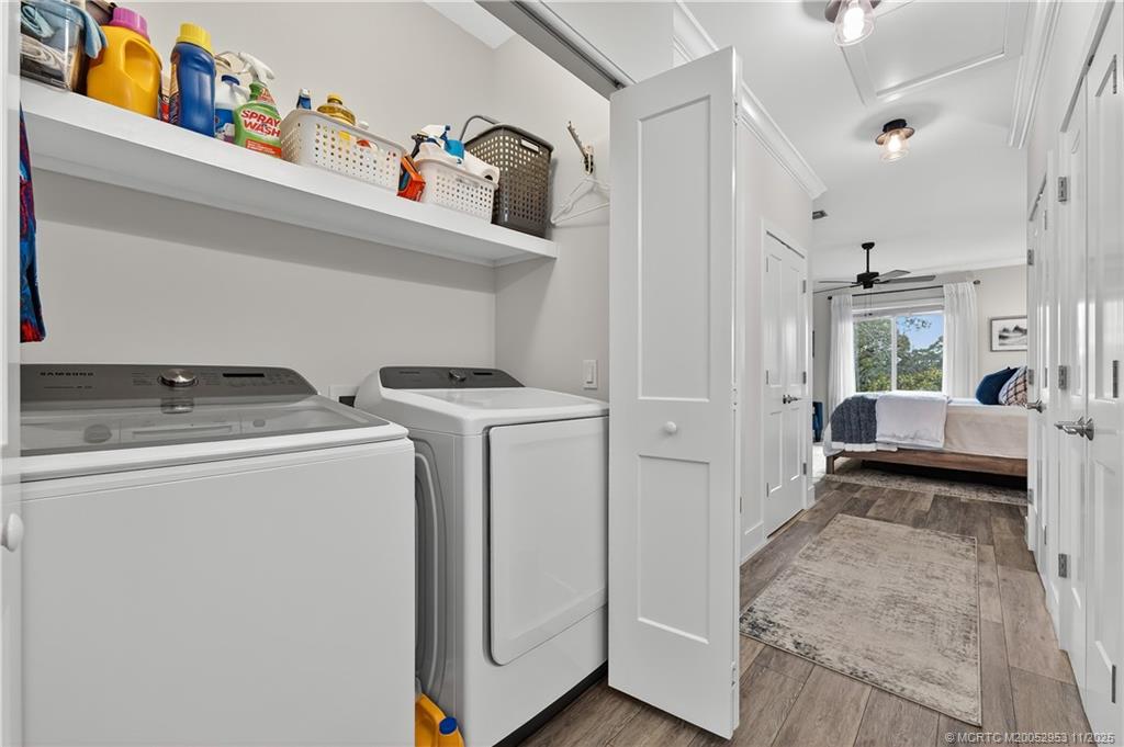 12463 Harbour Ridge Boulevard, Unit 26 Palm City, FL 34990 - Photo 19 of 34 a view of utility room with washer and dryer