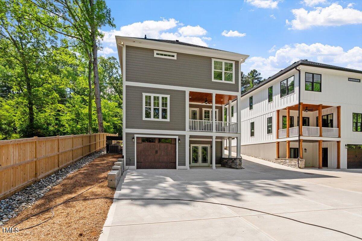 3932 Old Chapel Hill Road Durham, NC 27707 - Photo 43 of 46 a front view of a house with a yard