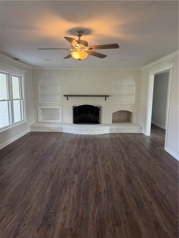 103 Barbara Ruth Drive Northwest Dalton, GA 30721 - Photo 4 of 8 a view of an empty room with wooden floor and fireplace