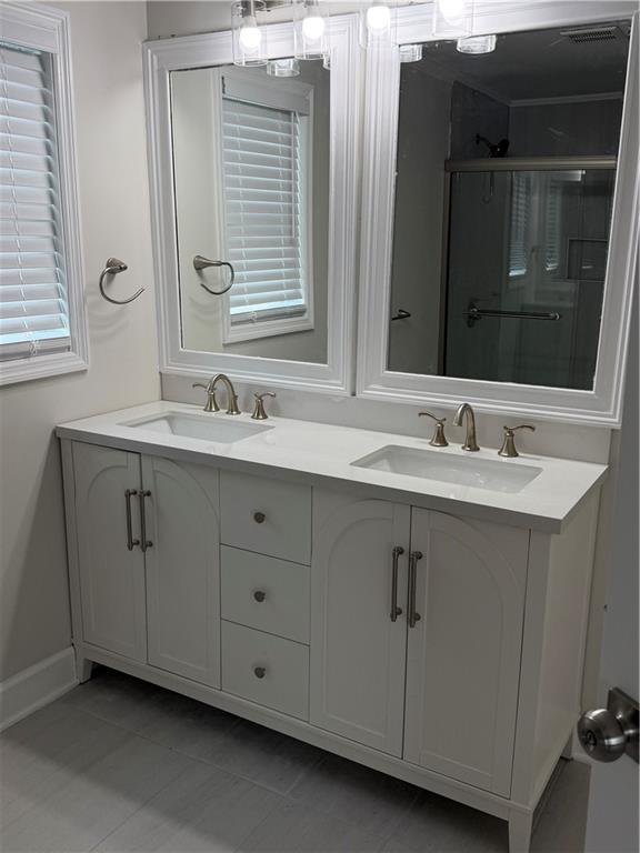 103 Barbara Ruth Drive Northwest Dalton, GA 30721 - Photo 5 of 8 a bathroom with a sink and a mirror