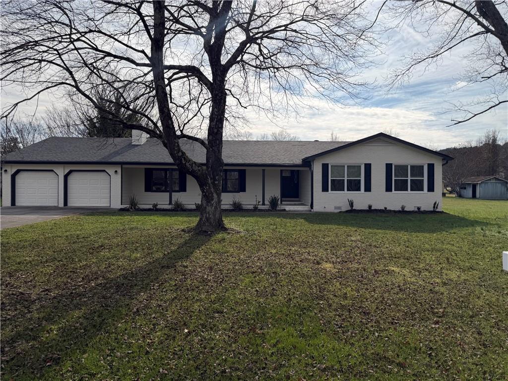 103 Barbara Ruth Drive Northwest Dalton, GA 30721 - Photo 8 of 8 a view of a house with a yard