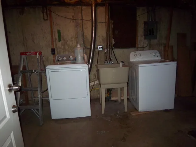 a utility room with dryer and washer