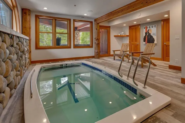 a view of a living room and bathroom