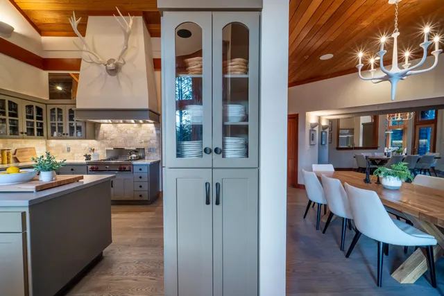 a kitchen with stainless steel appliances granite countertop a sink and cabinets