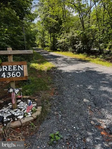 a view of a street with some trees