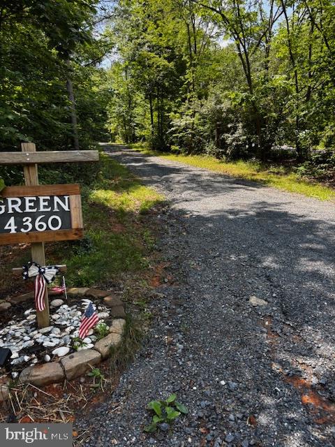 a view of a street with some trees