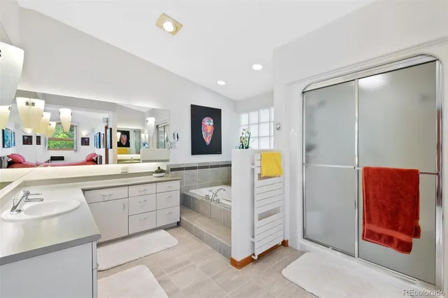 a view of kitchen with stainless steel appliances granite countertop cabinets and window