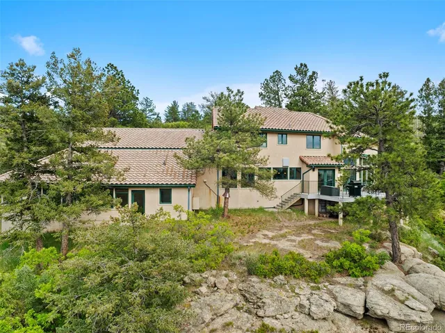 a garden view with a seating space