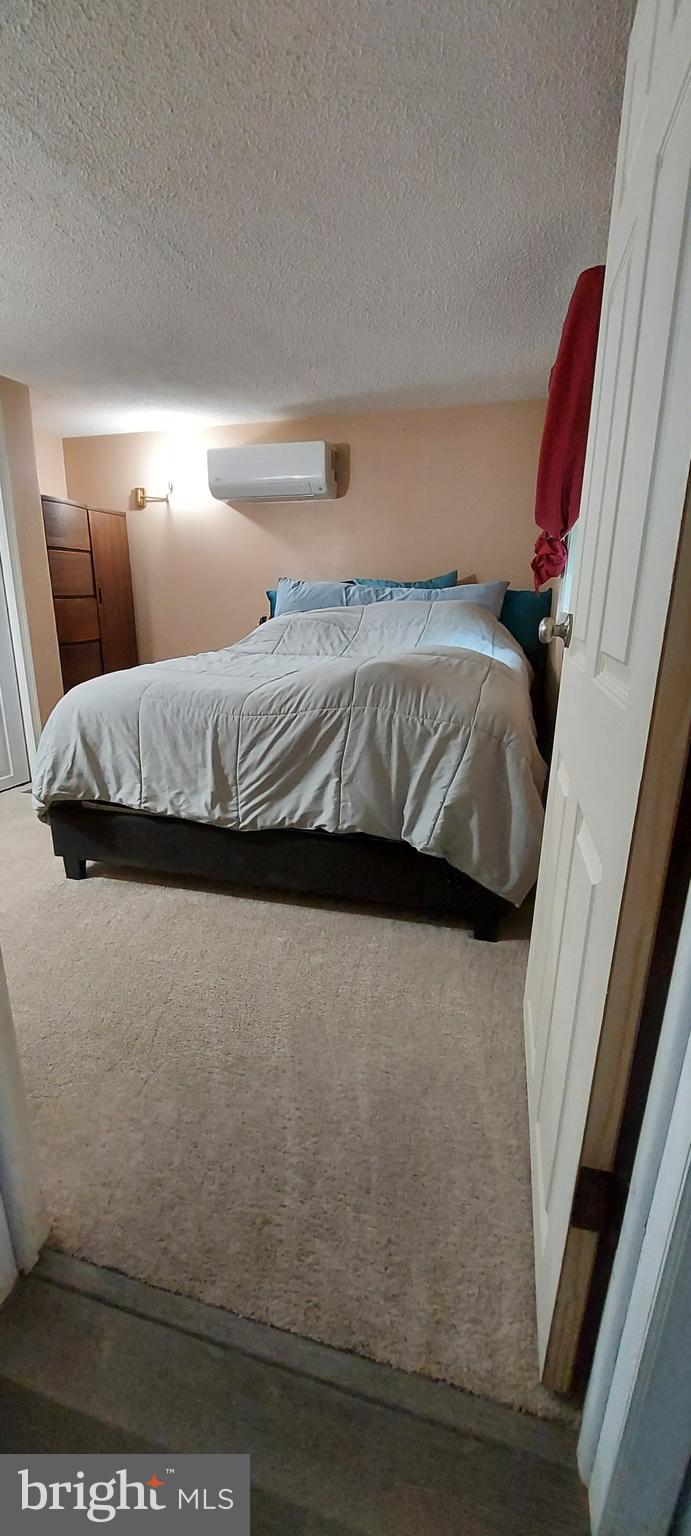 321 West 28th Division Highway Lititz, PA 17543 - Photo 12 of 15 a bedroom with a bed and a night stand