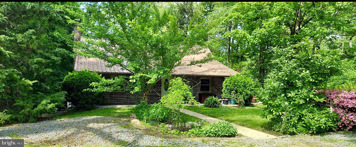 321 West 28th Division Highway Lititz, PA 17543 - Photo 2 of 15 a view of a garden with a fountain