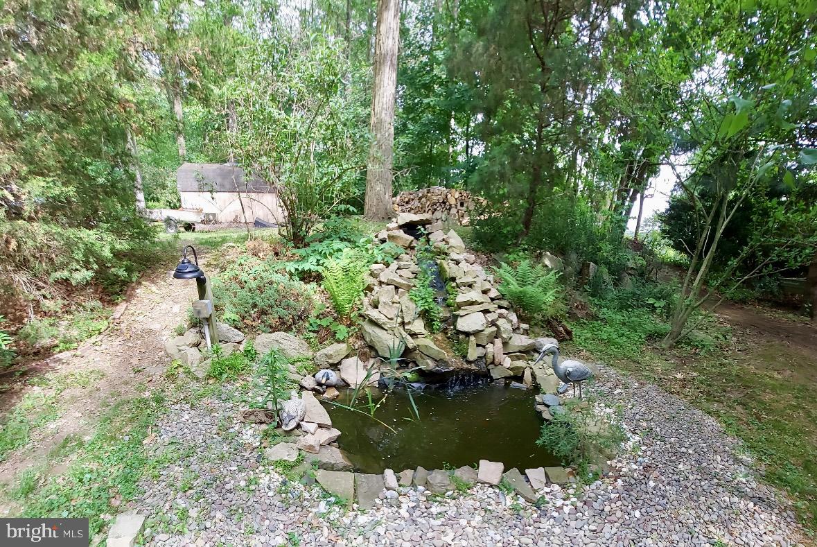 321 West 28th Division Highway Lititz, PA 17543 - Photo 3 of 15 a view of a garden with a fountain