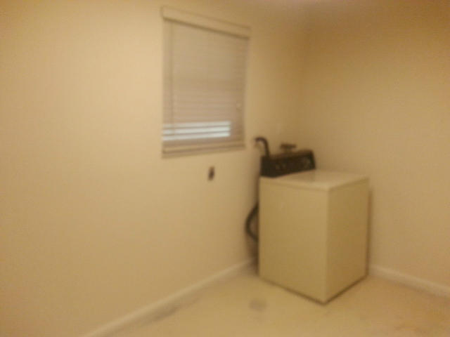 11844 Sandy Run Road Jupiter, FL 33478 - Photo 10 of 12 Laundry Room