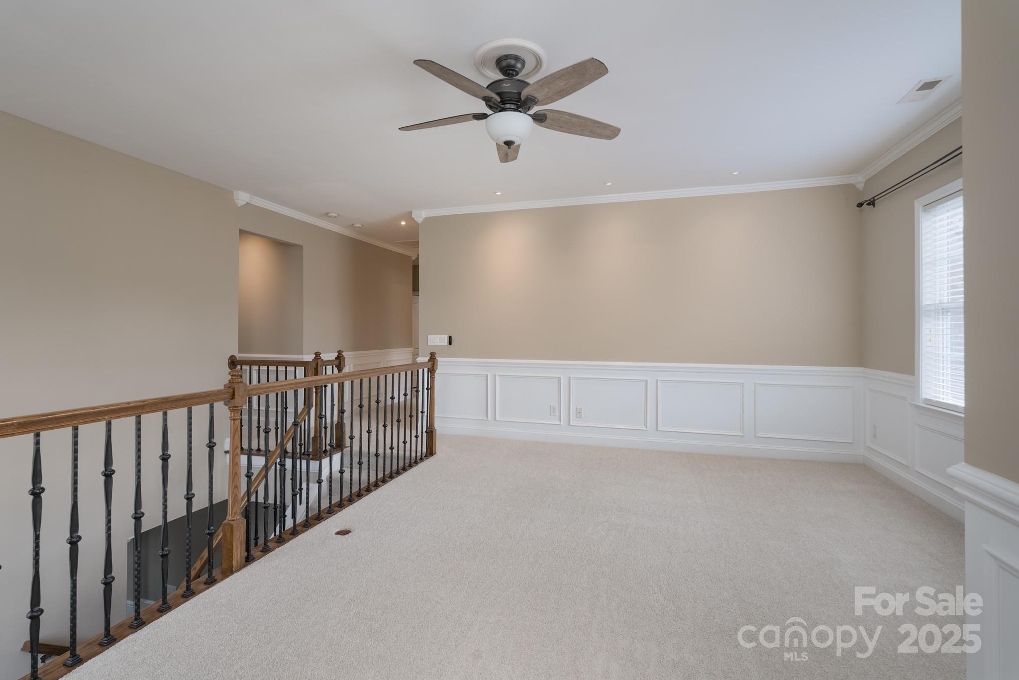 507 Quicksilver Trail Fort Mill, SC 29708 - Photo 23 of 48 a view of a livingroom with a ceiling fan and window