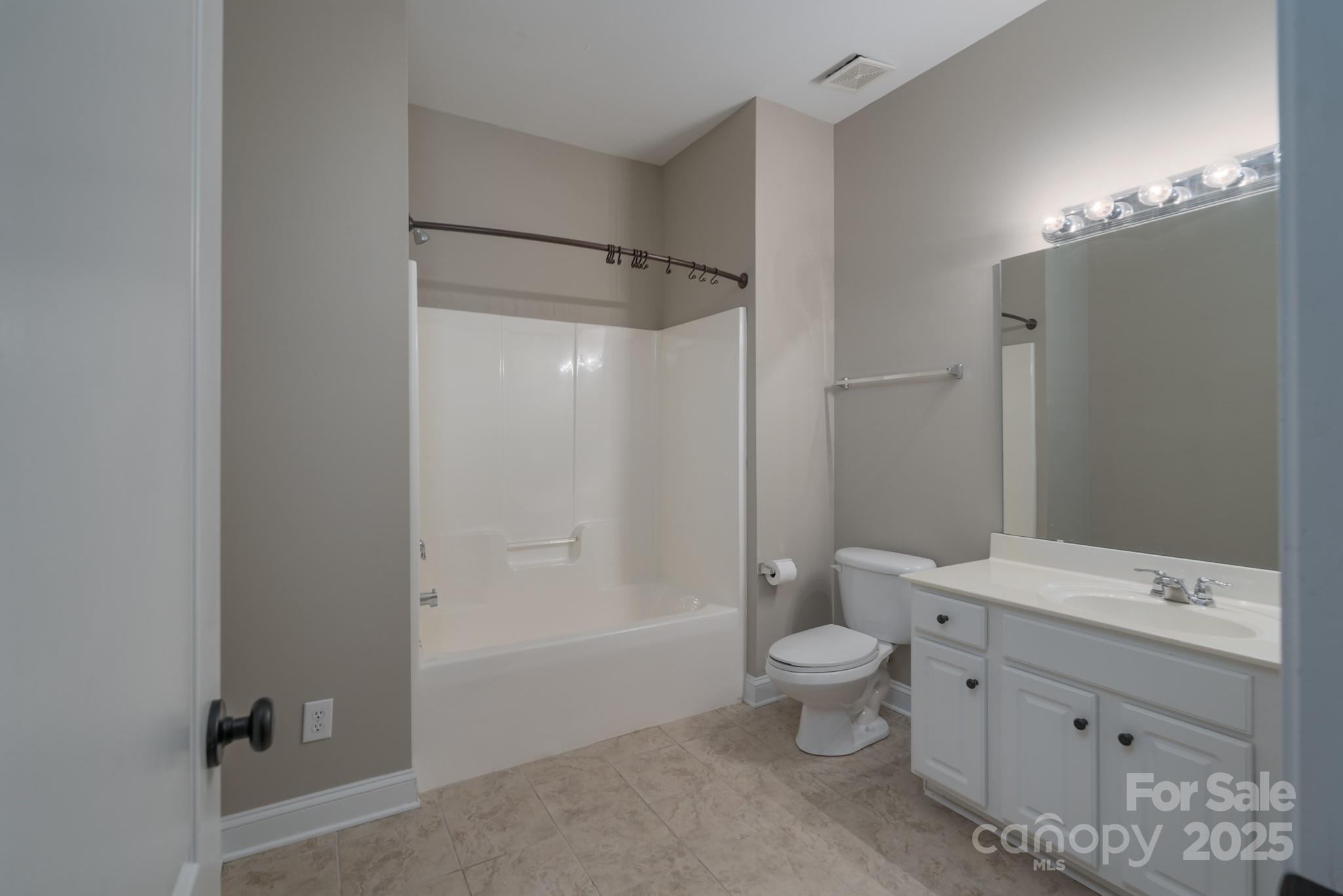 507 Quicksilver Trail Fort Mill, SC 29708 - Photo 29 of 48 a bathroom with a double vanity sink toilet mirror and shower