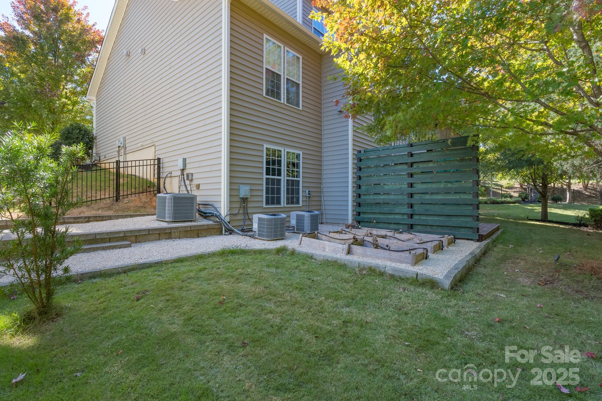507 Quicksilver Trail Fort Mill, SC 29708 - Photo 45 of 48 a view of a chair and table in backyard of the house