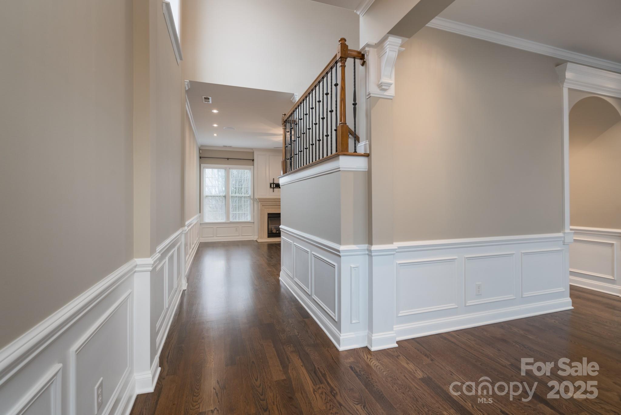 507 Quicksilver Trail Fort Mill, SC 29708 - Photo 5 of 48 a view of a hallway view with wooden floor and staircase