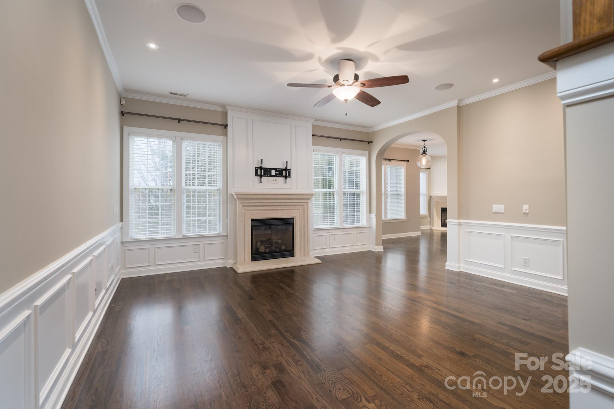 507 Quicksilver Trail Fort Mill, SC 29708 - Photo 6 of 48 a view of an empty room with wooden floor and a window