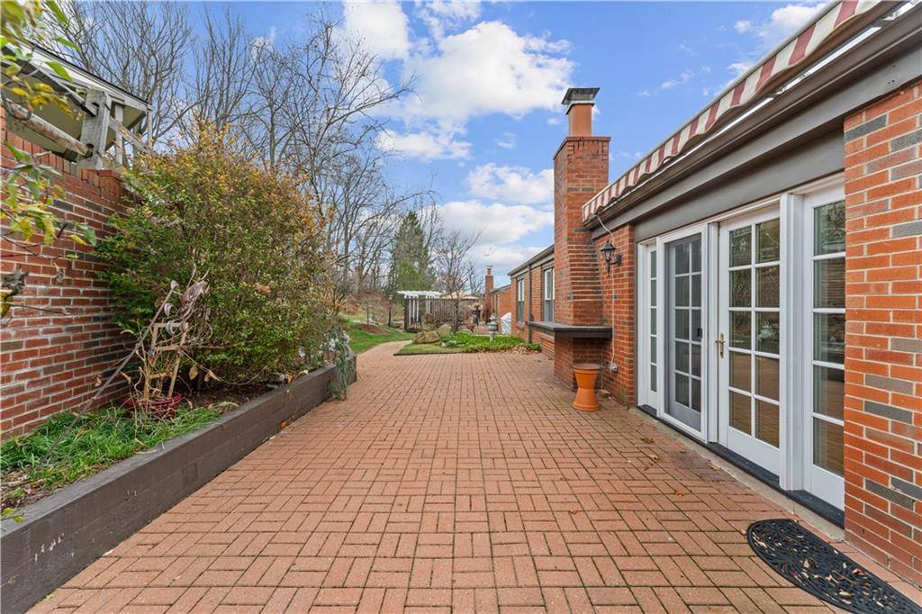 1033 Rutledge Drive Pittsburgh, PA 15241 - Photo 27 of 32 a view of a pathway both side of house