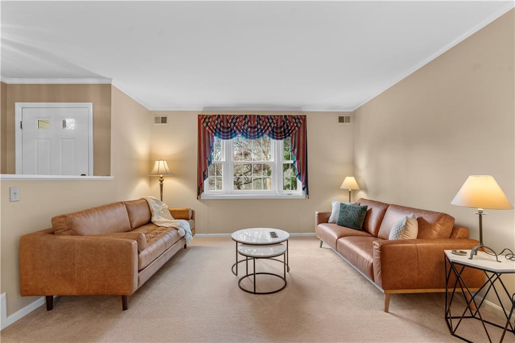 1033 Rutledge Drive Pittsburgh, PA 15241 - Photo 4 of 32 a living room with furniture and a lamp