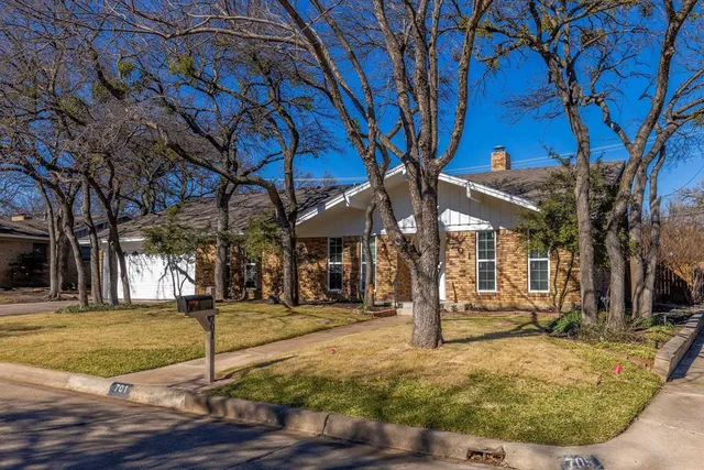 a view of a park with tree s