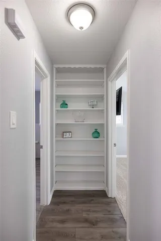 a living room with fireplace furniture and a flat screen tv