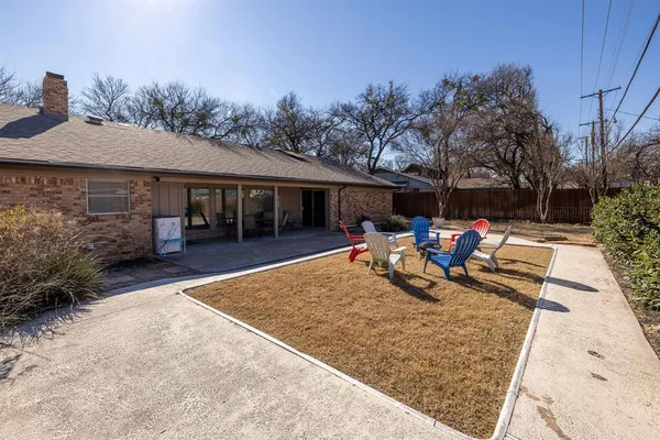 a bedroom with a bed and flat screen tv