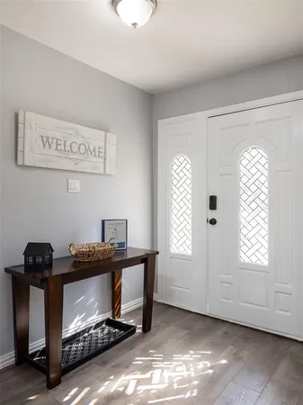 a view of room with window and furniture
