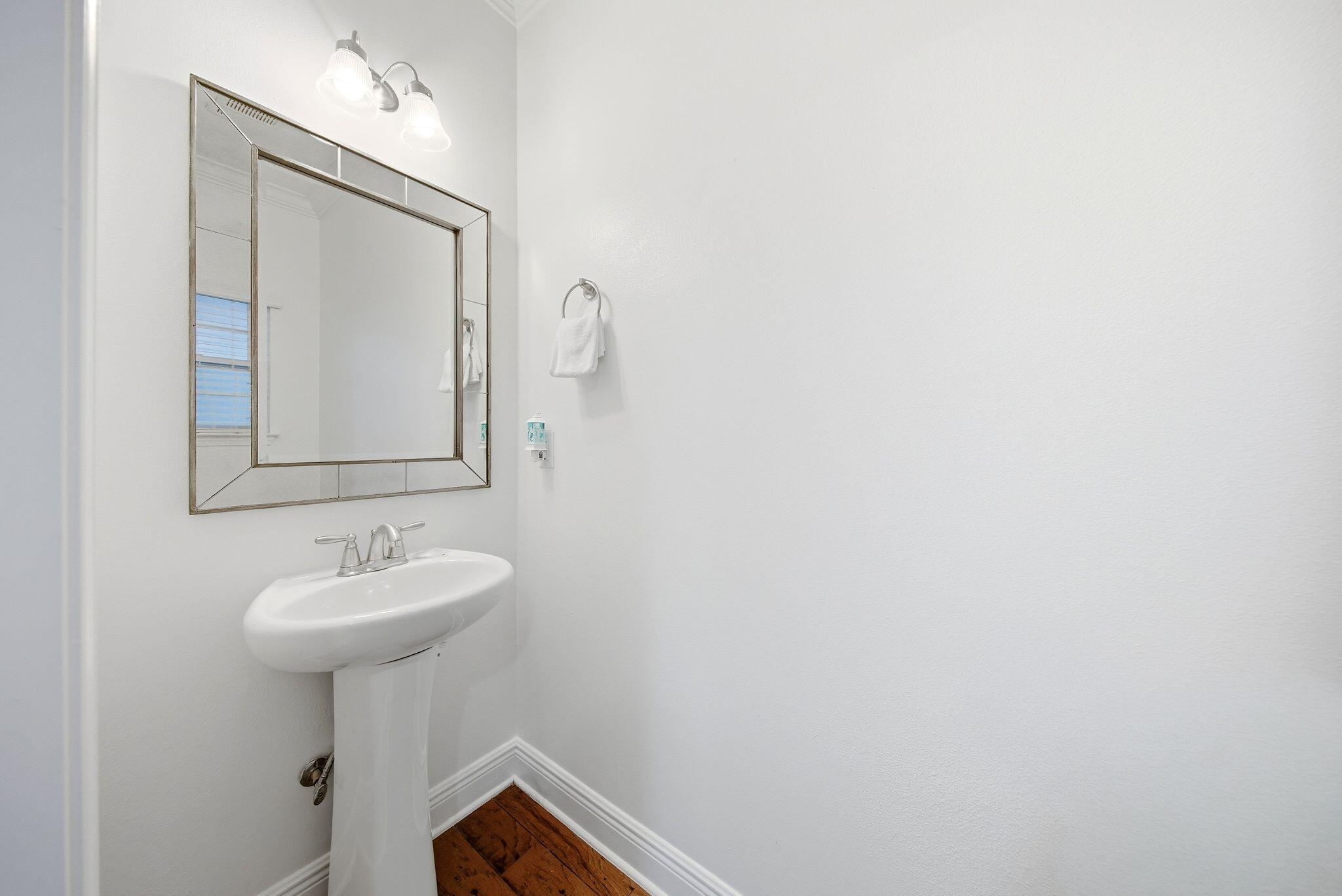 54 West Shore Place Inlet Beach, FL 32461 - Photo 22 of 38 a bathroom with a sink a mirror and a vanity