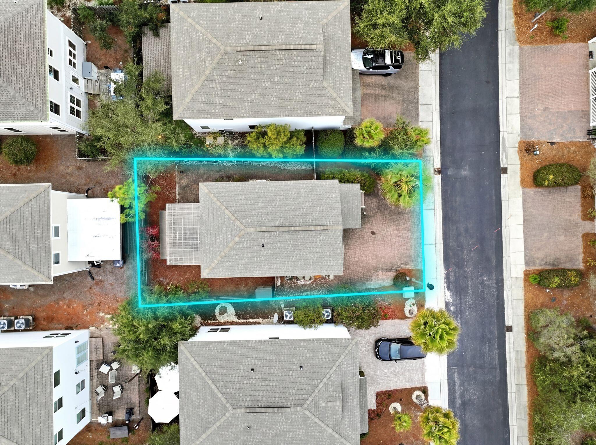 54 West Shore Place Inlet Beach, FL 32461 - Photo 32 of 38 an aerial view of a house with a yard and a large tree