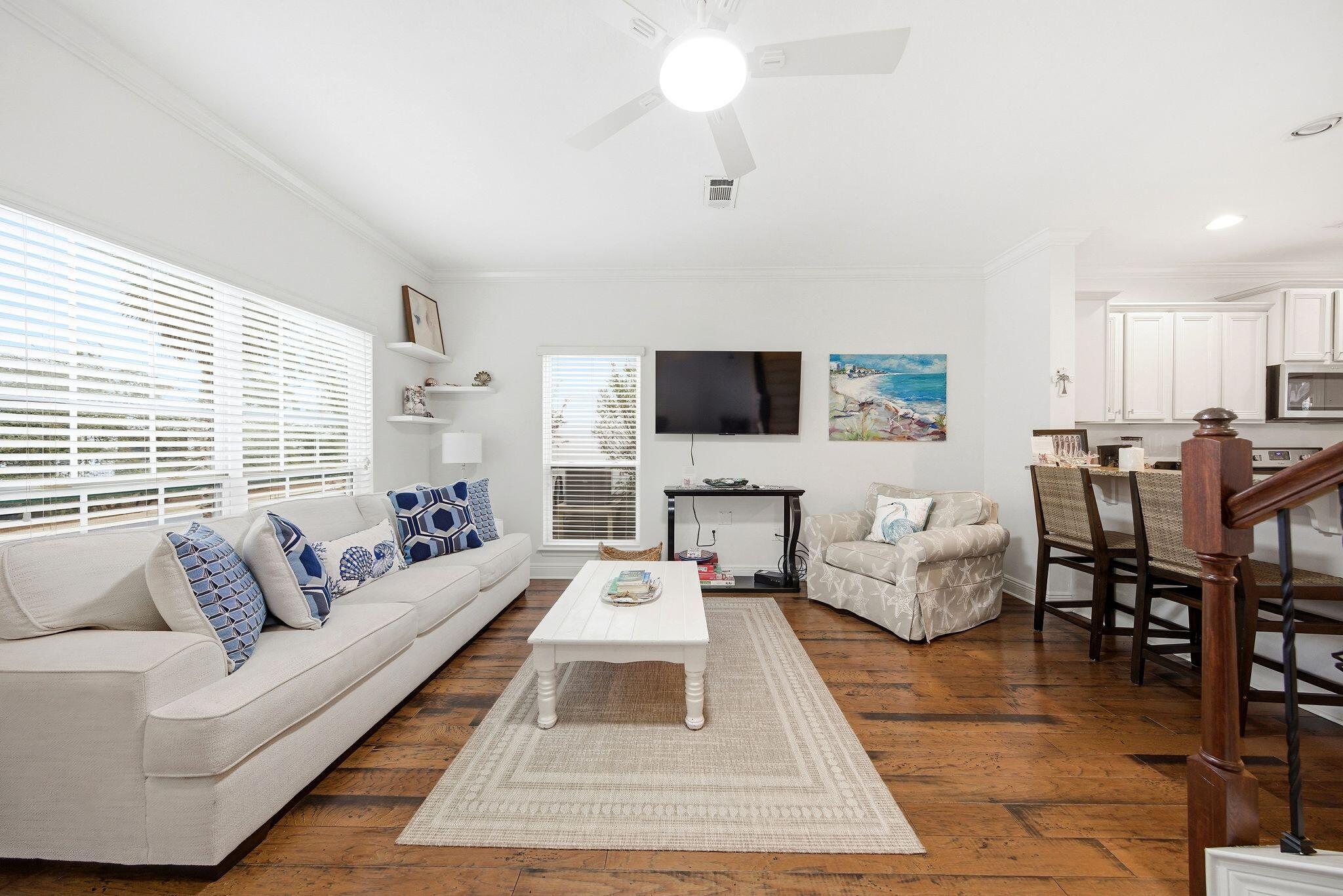 54 West Shore Place Inlet Beach, FL 32461 - Photo 4 of 38 a living room with furniture and a flat screen tv