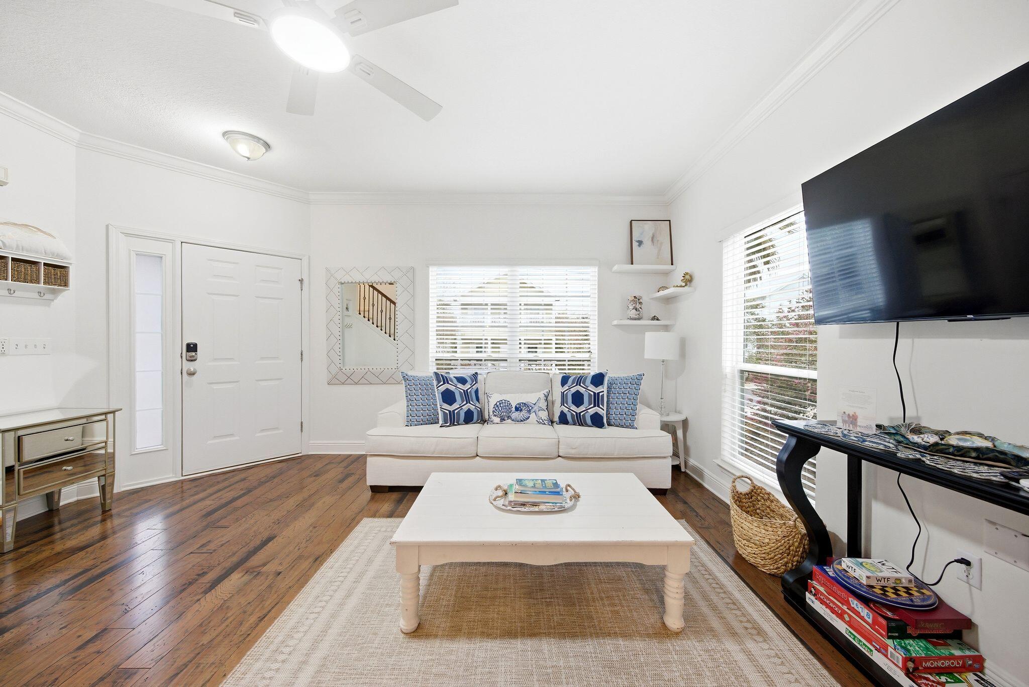 54 West Shore Place Inlet Beach, FL 32461 - Photo 6 of 38 a living room with furniture fireplace and flat screen tv