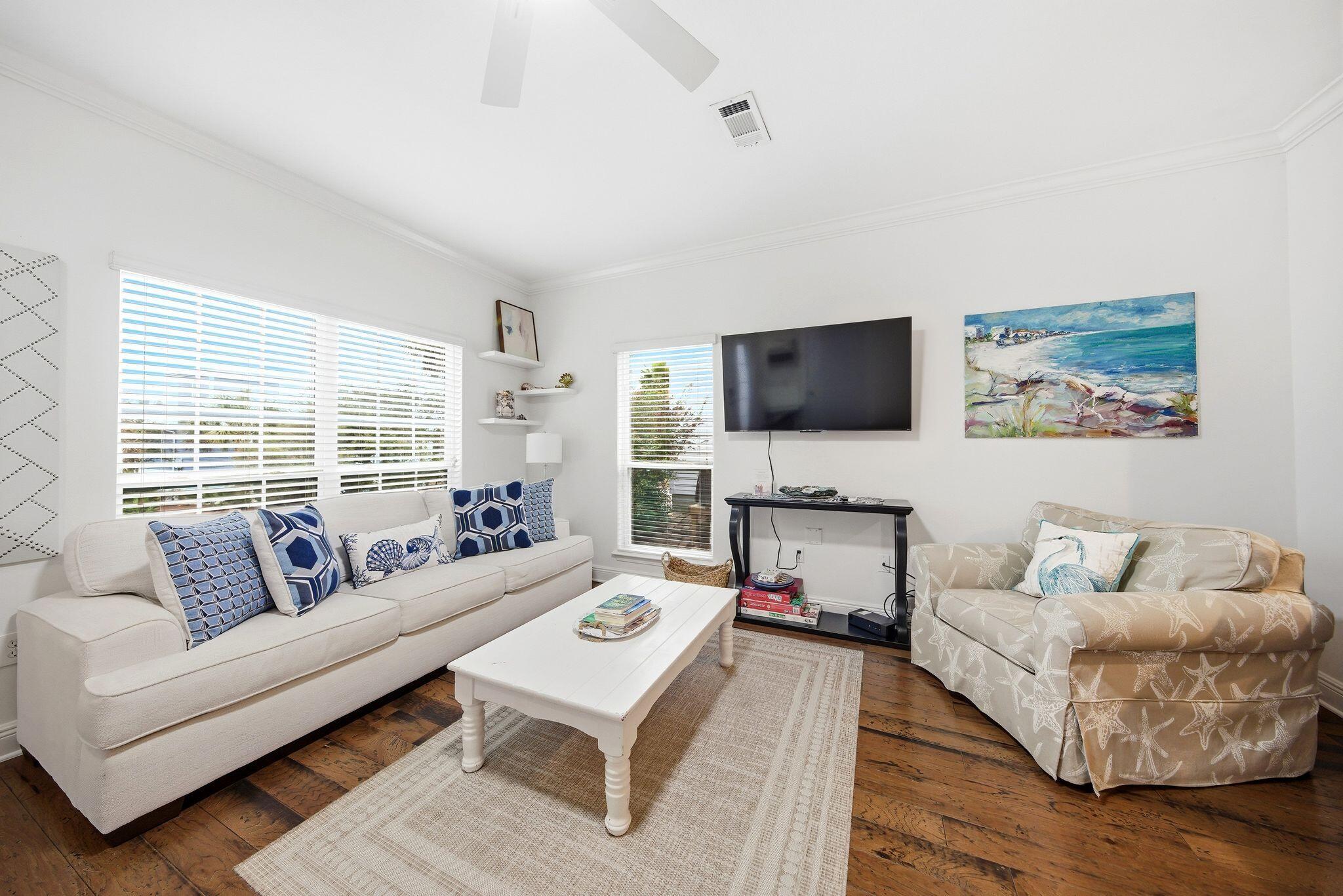 54 West Shore Place Inlet Beach, FL 32461 - Photo 7 of 38 a living room with furniture and a flat screen tv