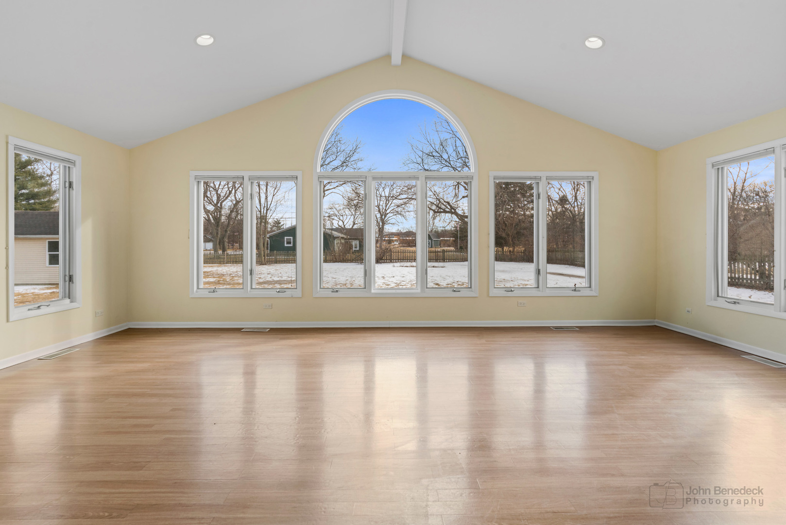 1931 Cranbrook Drive Green Oaks, IL 60048 - Photo 11 of 33 an empty room with wooden floor and windows
