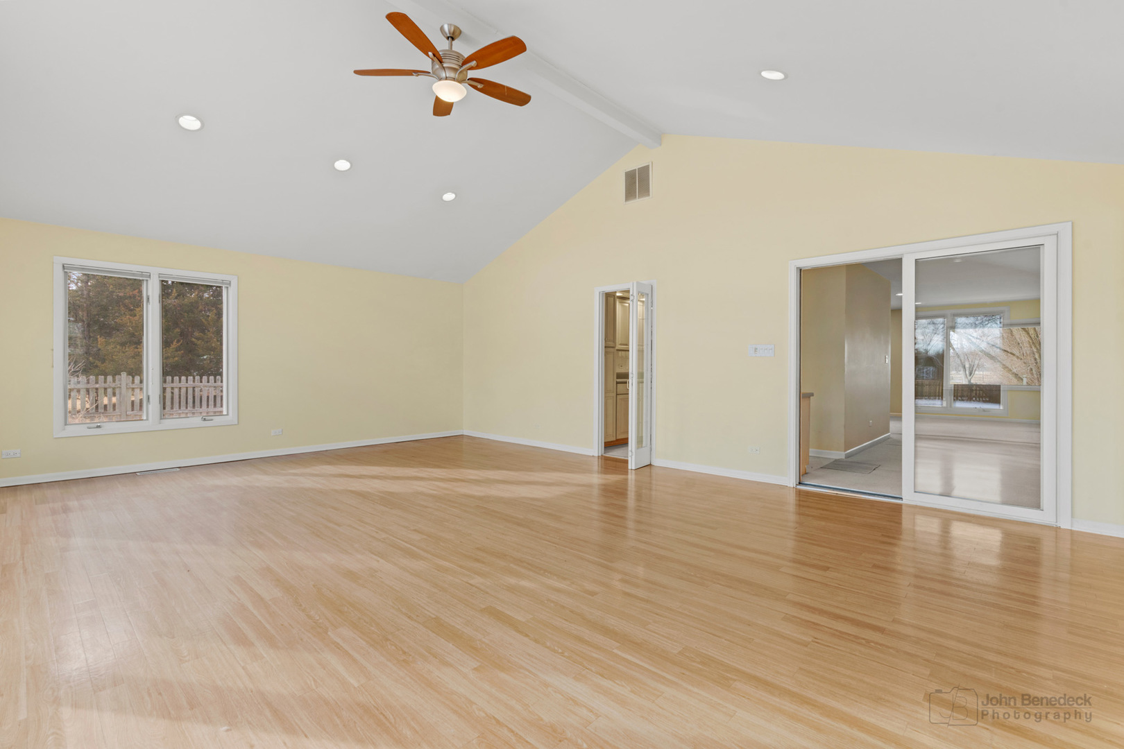 1931 Cranbrook Drive Green Oaks, IL 60048 - Photo 12 of 33 a view of an empty room with wooden floor and a window