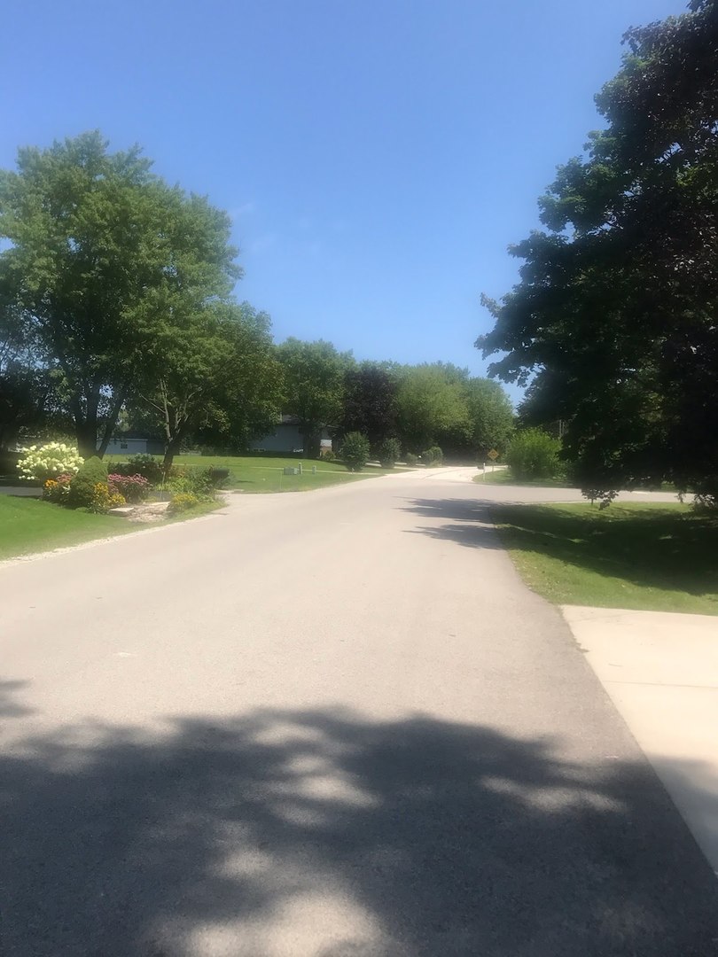 1931 Cranbrook Drive Green Oaks, IL 60048 - Photo 32 of 33 a view of swimming pool with a yard
