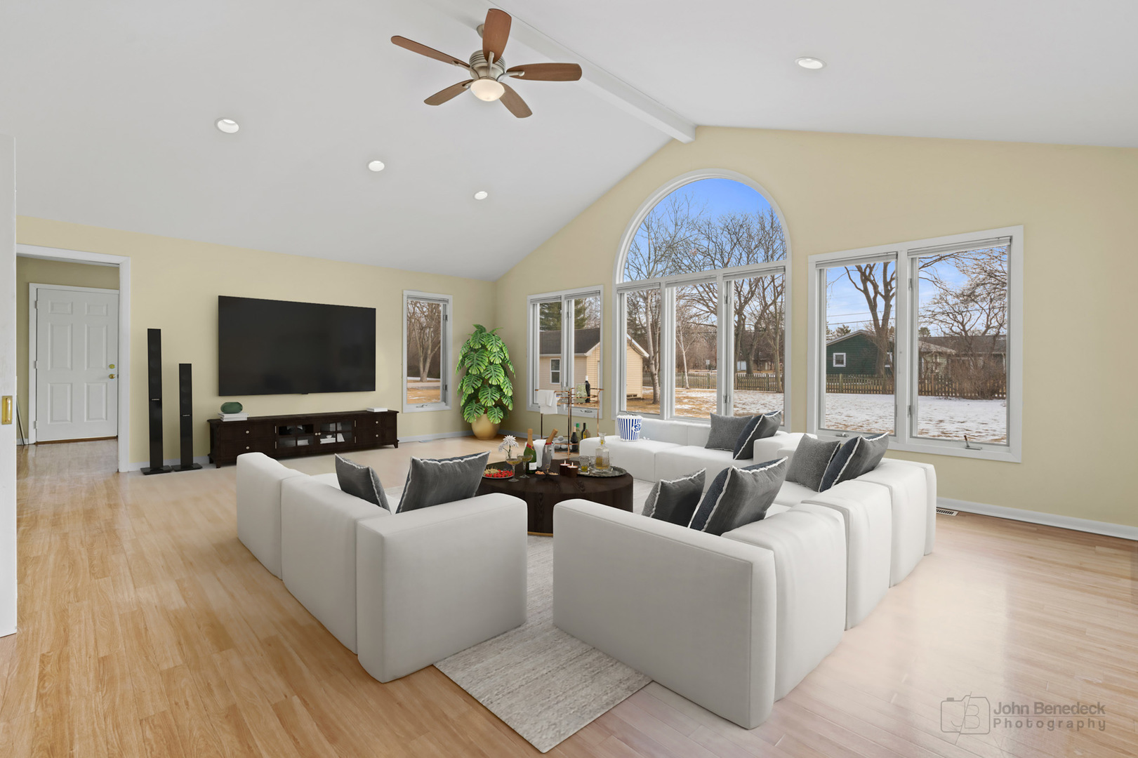 1931 Cranbrook Drive Green Oaks, IL 60048 - Photo 10 of 33 a living room with furniture a ceiling fan and a flat screen tv