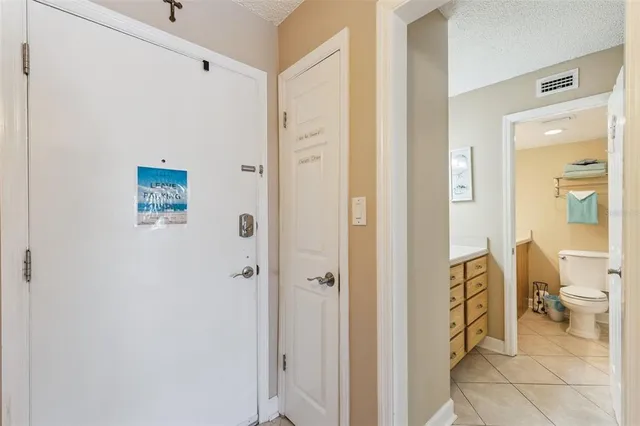 a bathroom with a shower and a toilet