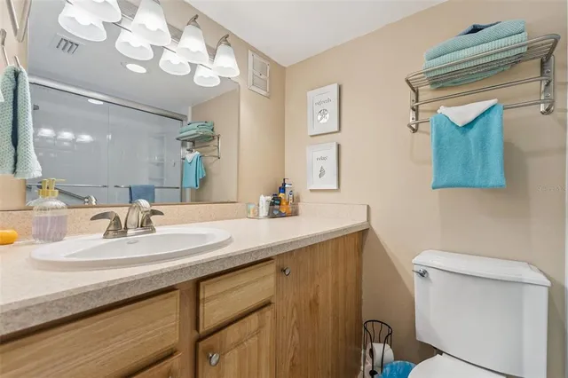 a kitchen with a stove a sink and a refrigerator