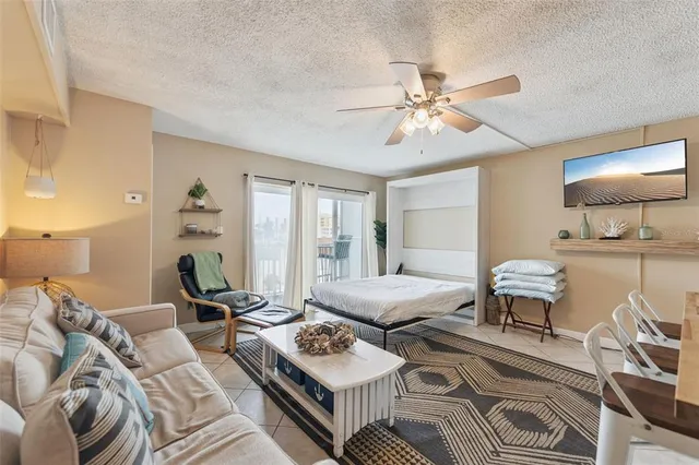 a view of room with furniture and a window