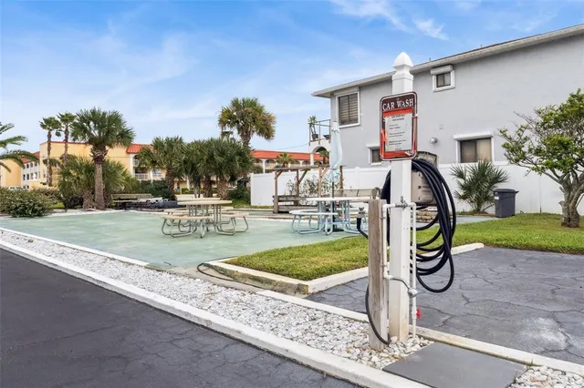 a view of a house with a street
