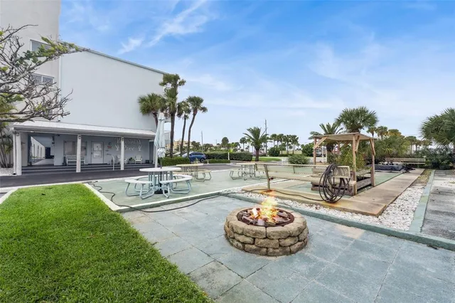 a front view of a building with parking space