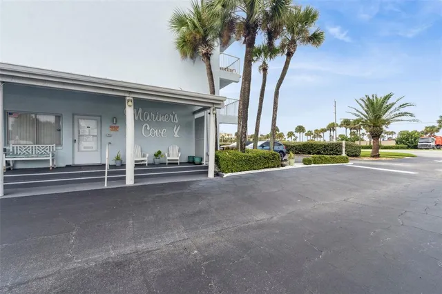 a view of a terrace with chairs